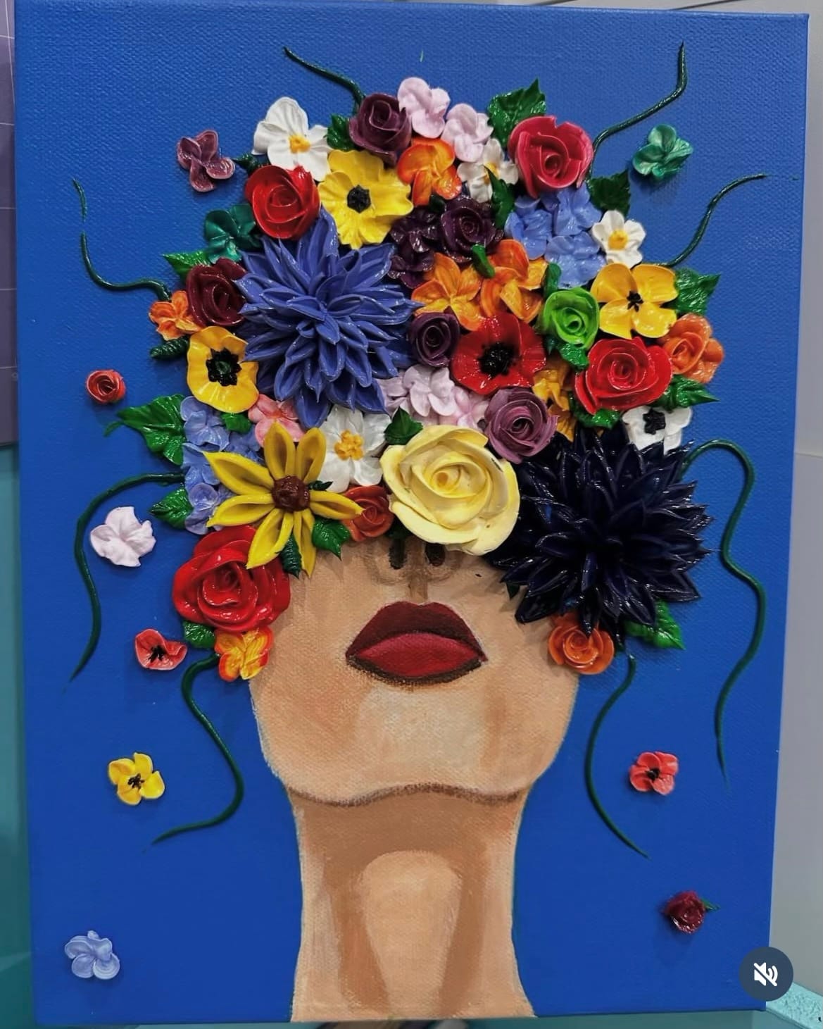 Digital artwork of a woman's face with eyes obscured by a vibrant crown of colorful flowers on a blue background, evoking creativity and whimsy.
