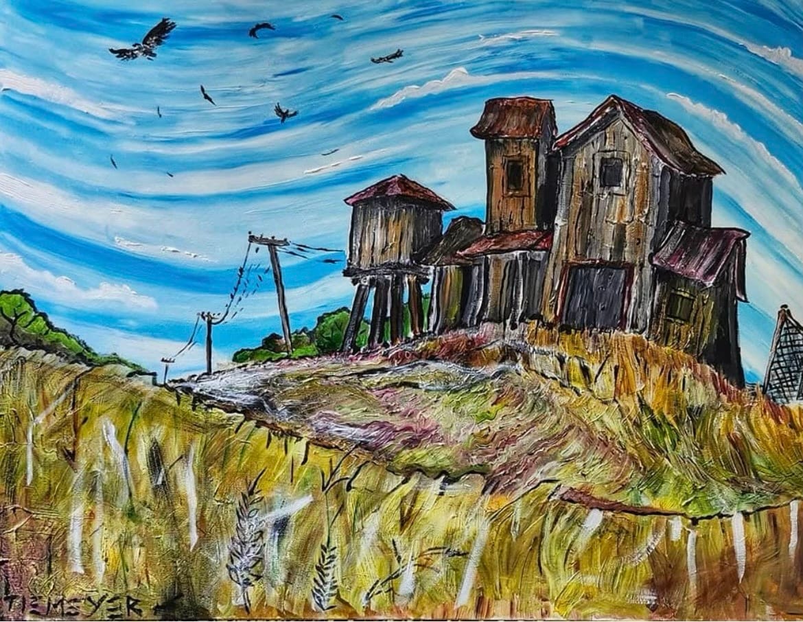 A rustic, weathered wooden house and water tower stand on a hill under a swirling blue sky. Birds fly overhead, conveying a sense of isolation.